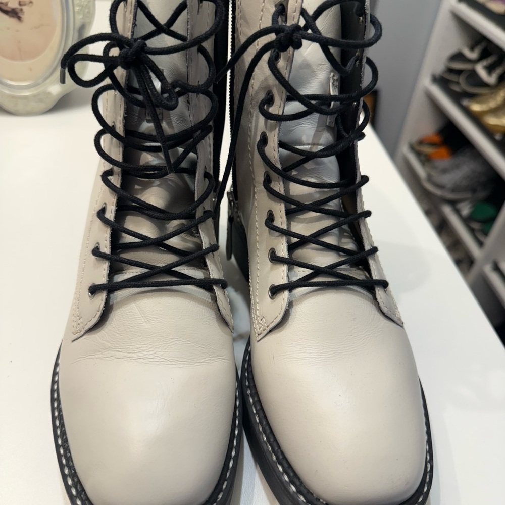 SCHUTZ Cream and Black Combat Moto Boots with Lace-Up Design